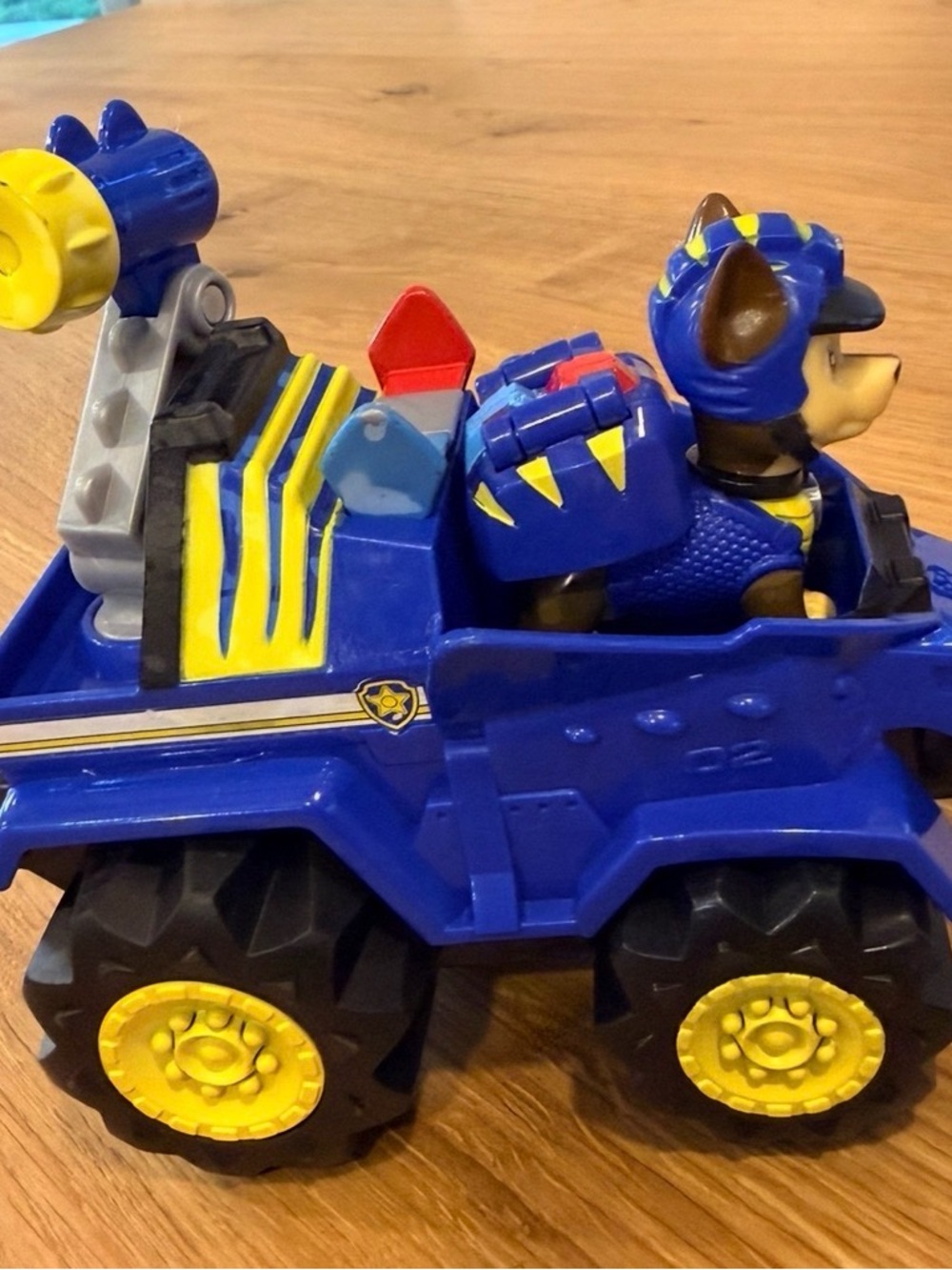 PAW Patrol Dino Rescue Chase’s Deluxe Rev Up Vehicle + pup